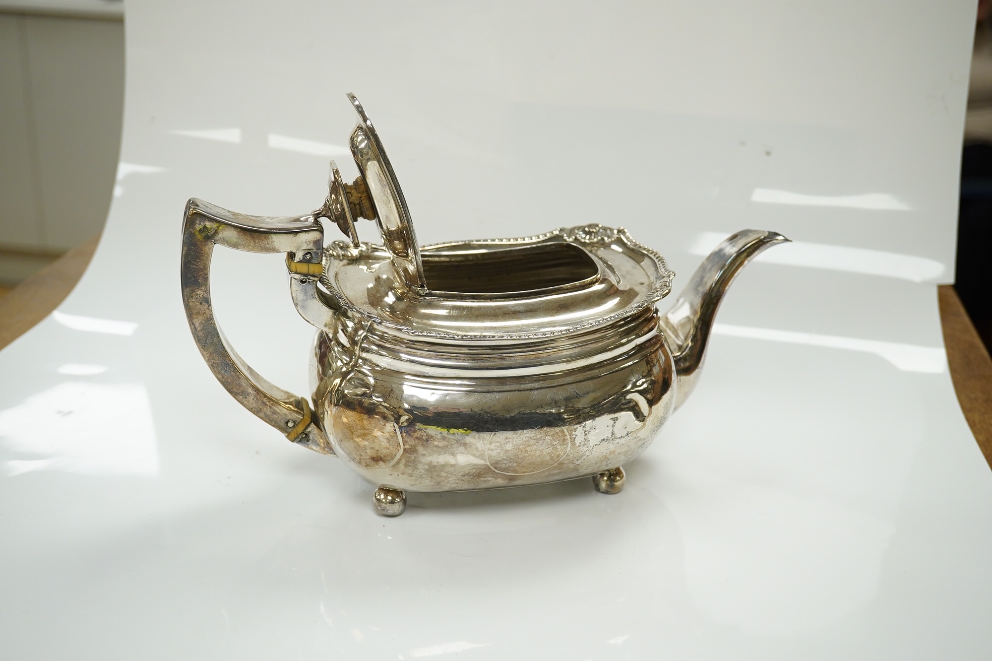 A George III silver teapot, Charles Chesterman II, London, 1810, gross weight 17.9oz. CITES Submission reference 85XWF6ED. Condition - poor